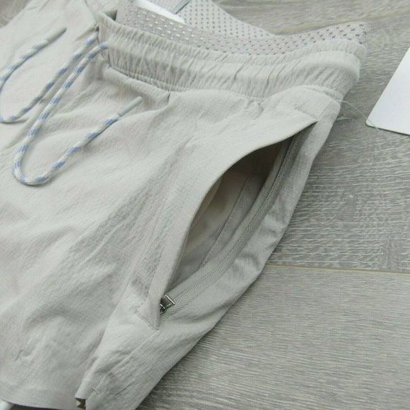 Athleta Trekkie Crest 2 in 1 Shortie Womens Size 12 Shorts Birch Grey NEW - Picture 4 of 9